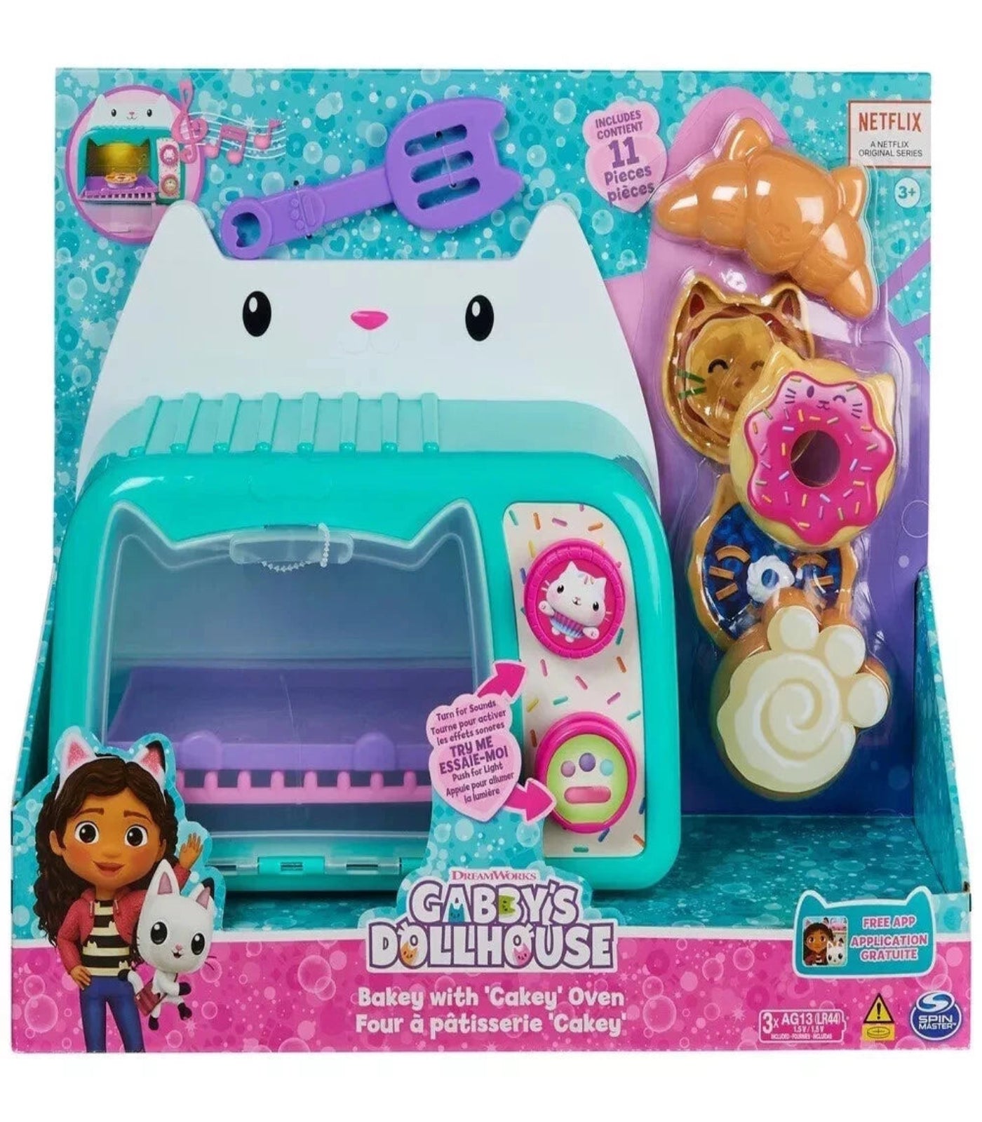 Toy oven set with baking items in a colorful packaging featuring Dora the Explorer branding.