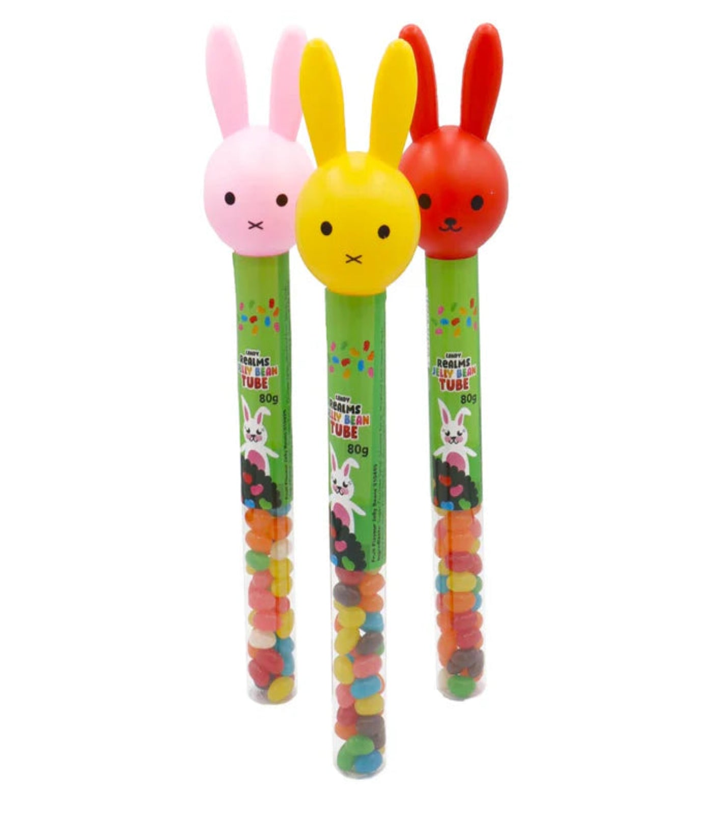 Three colorful candy tubes with bunny-shaped ends on a white background