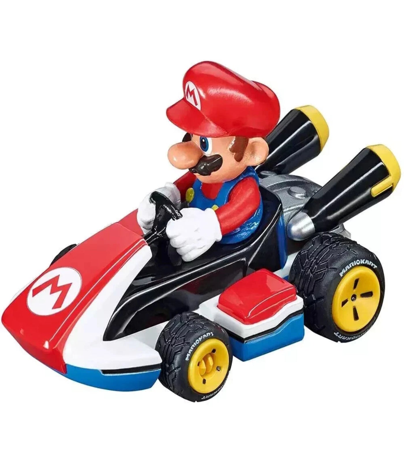 Toy figure of a character in a red hat and blue shirt driving a red and black kart with yellow wheels on a white background.
