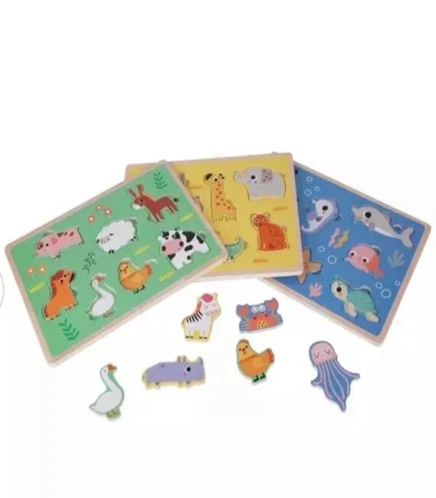Set of wooden puzzles with animal illustrations on a white background