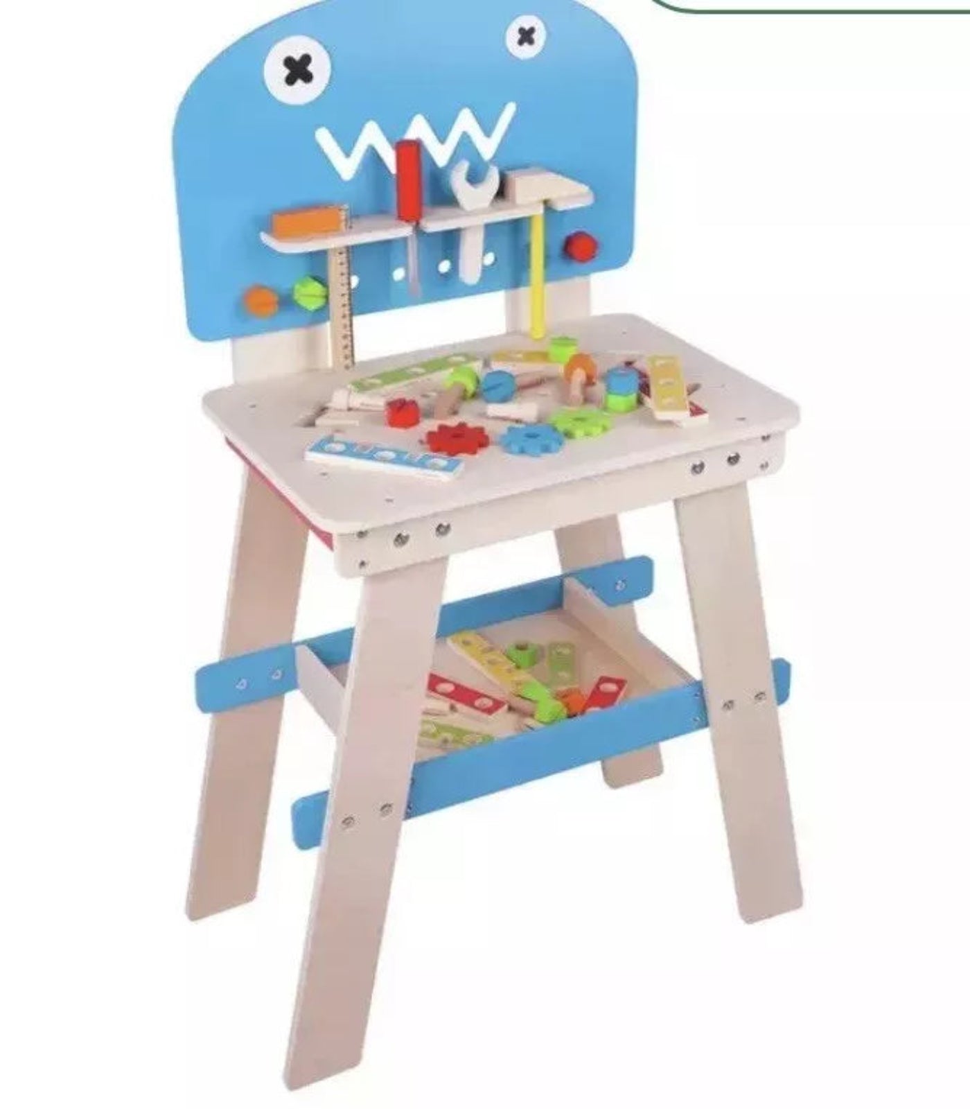 Children's wooden play kitchen with blue monster face on a white background