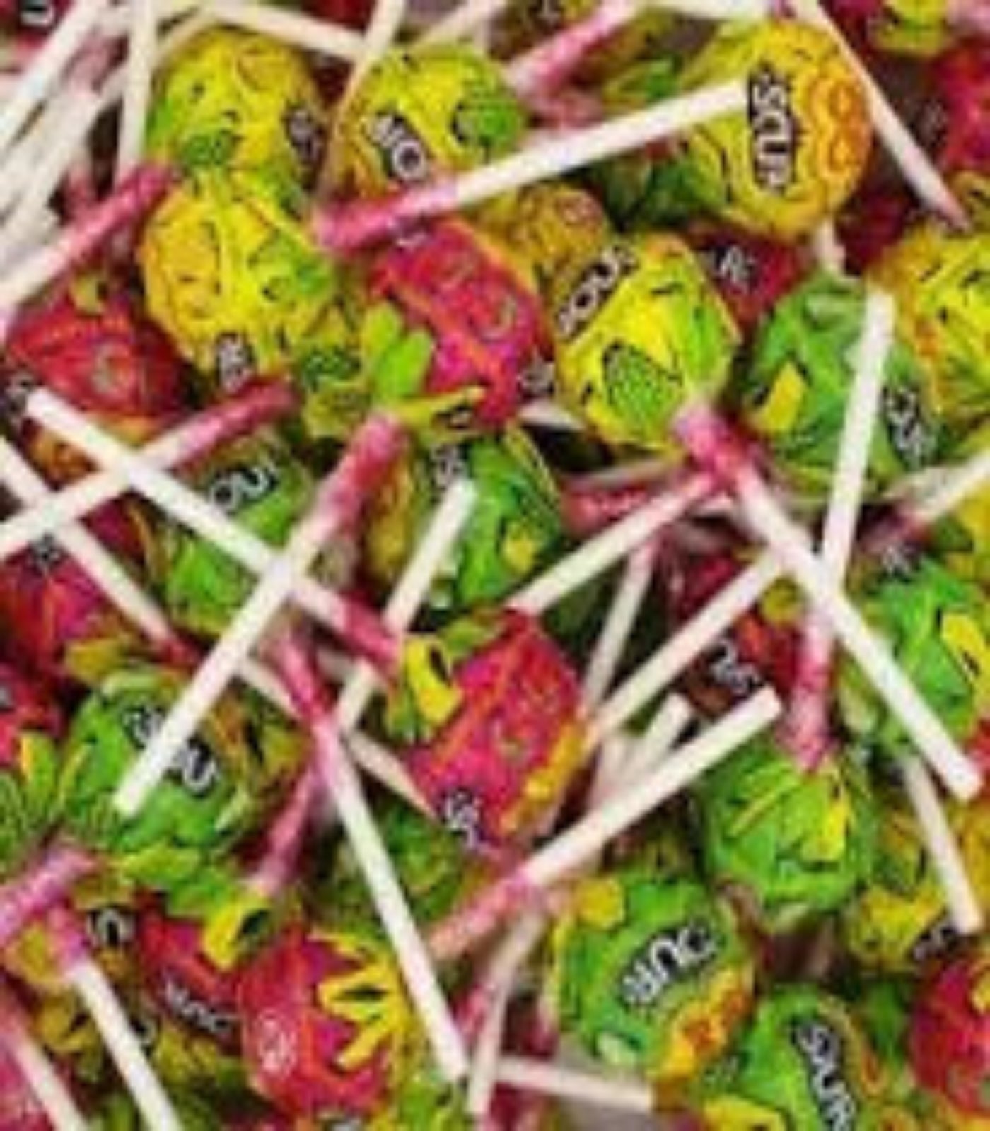 Assorted colorful lollipops on a white background