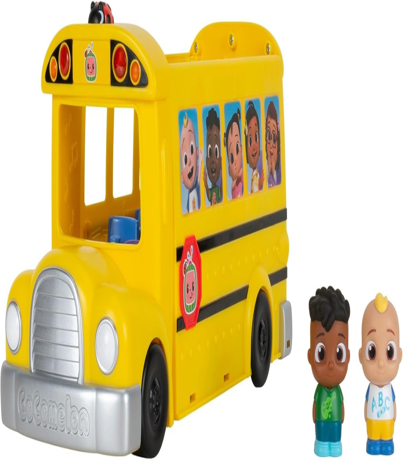 Toy school bus with multiple faces on the front and two small figures standing next to it.