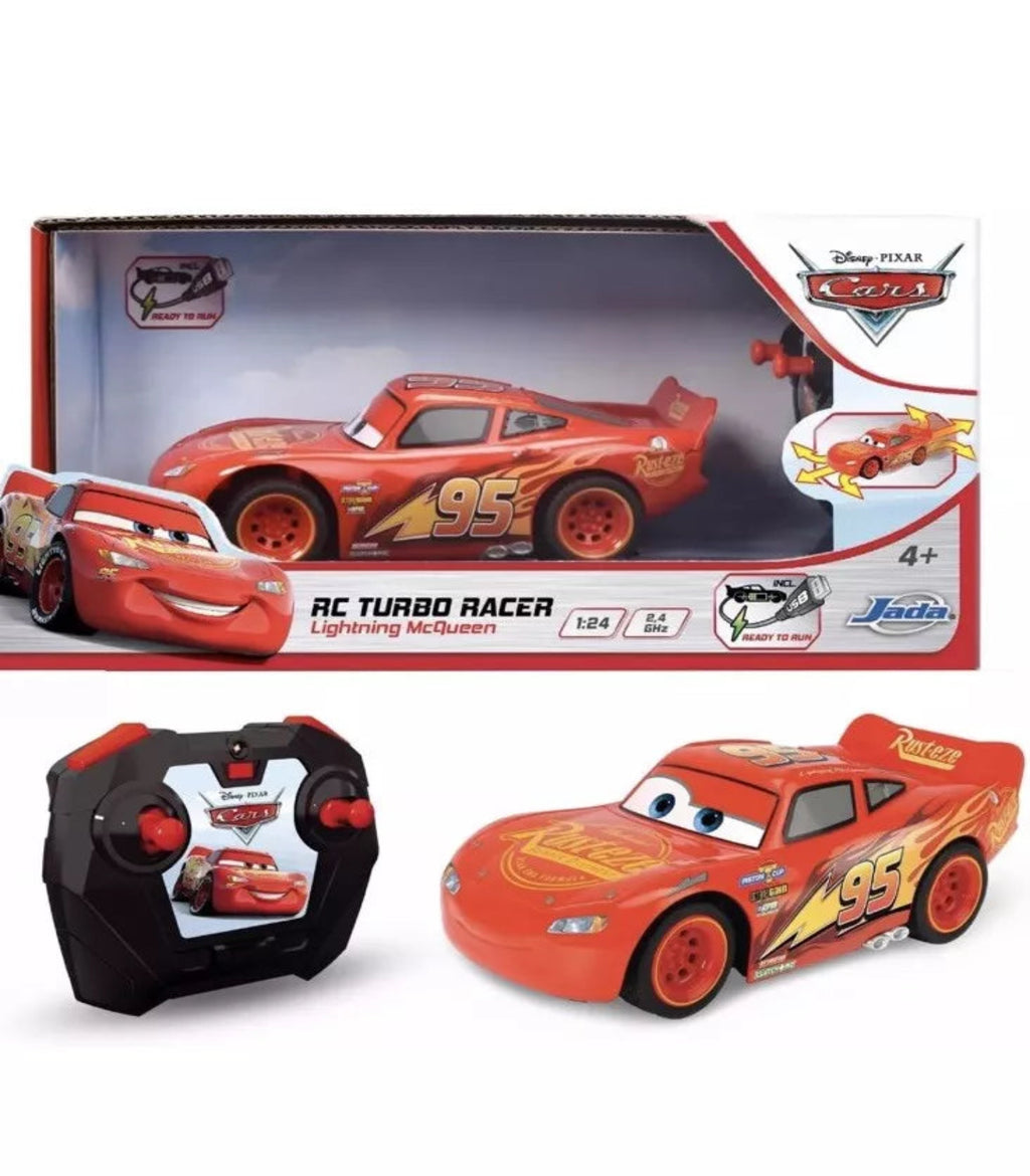 Toy car with remote control and packaging featuring Disney Cars branding