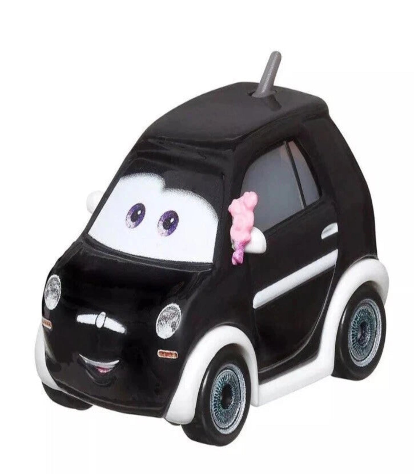 Toy car with a face and pink bow on a white background