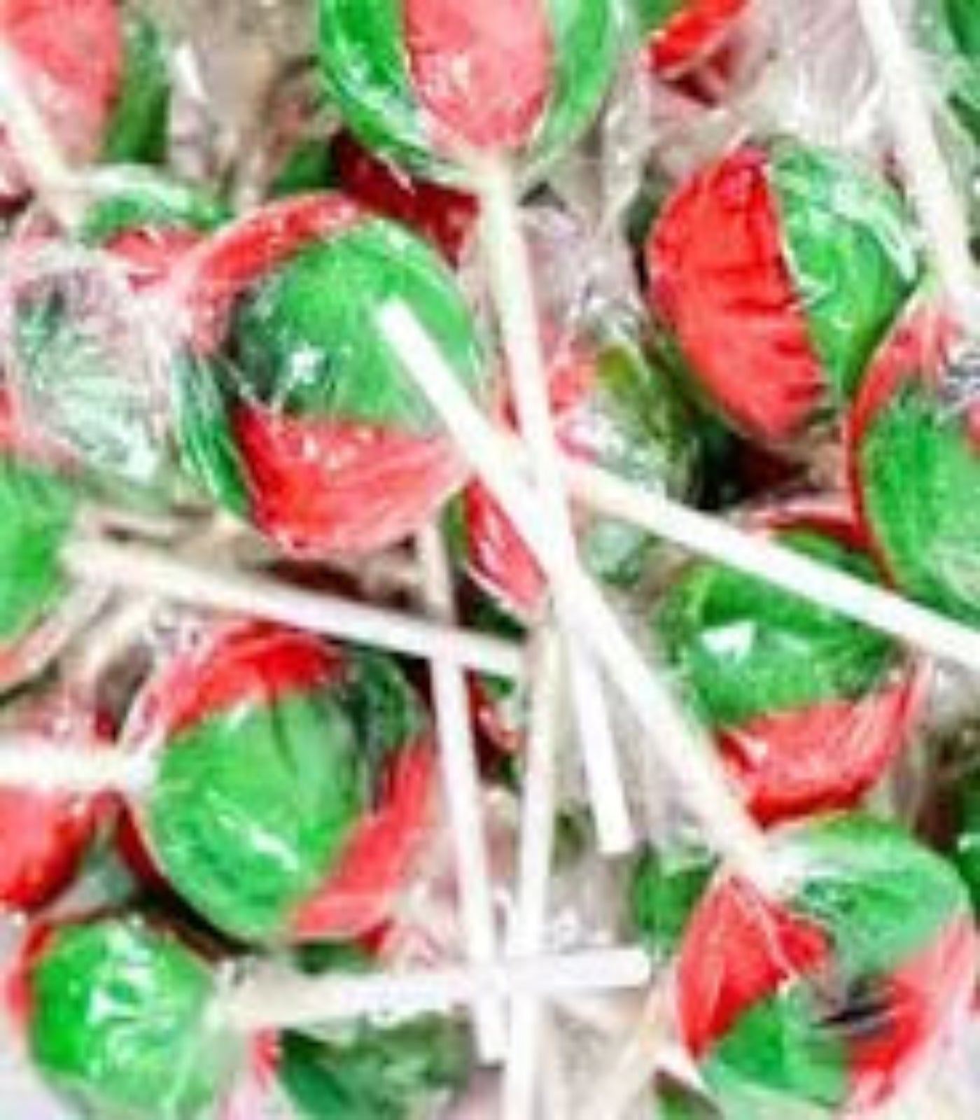 Assorted lollipops with red and green colors on a white background