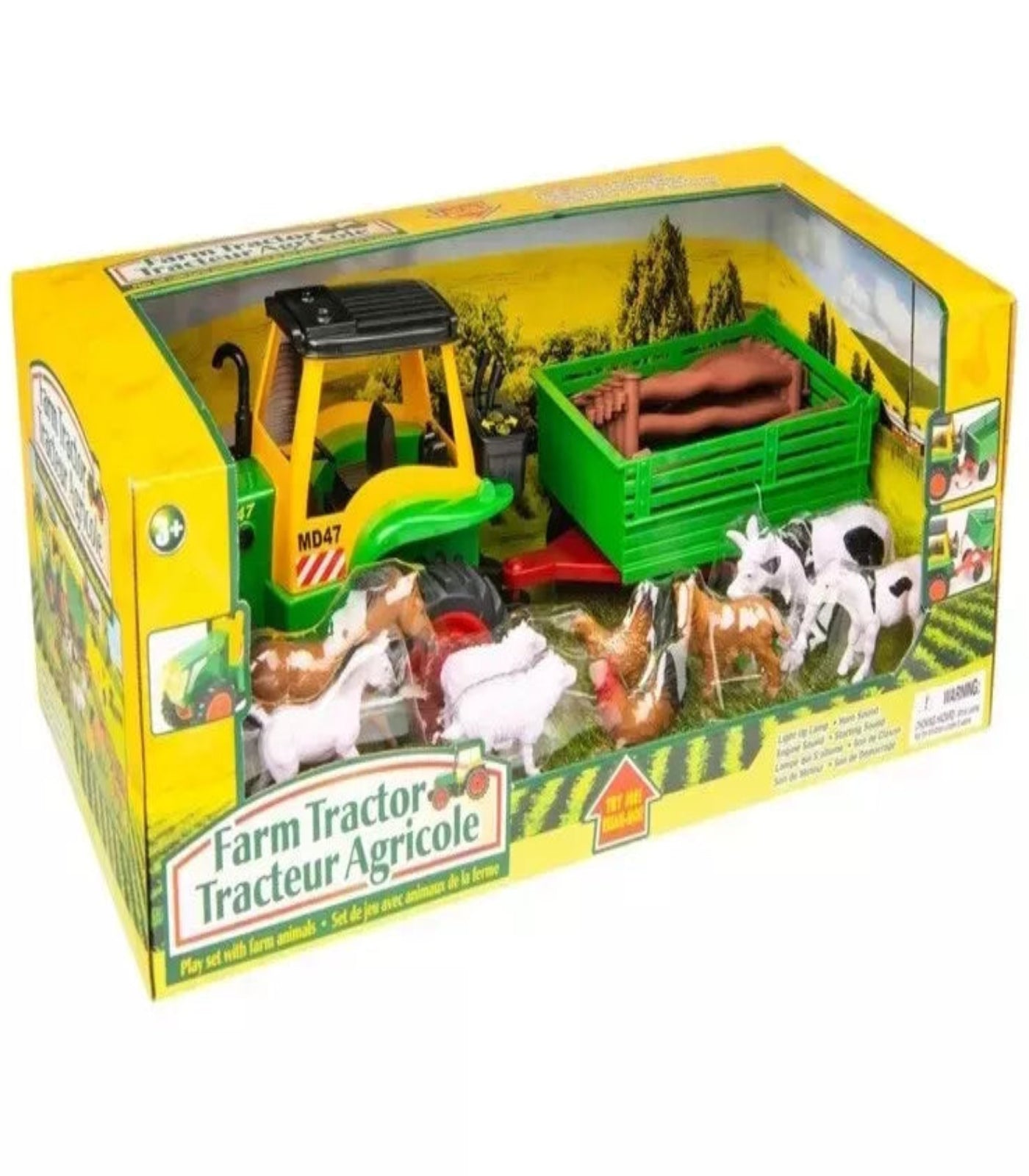 Toy farm tractor set with animals and equipment in packaging