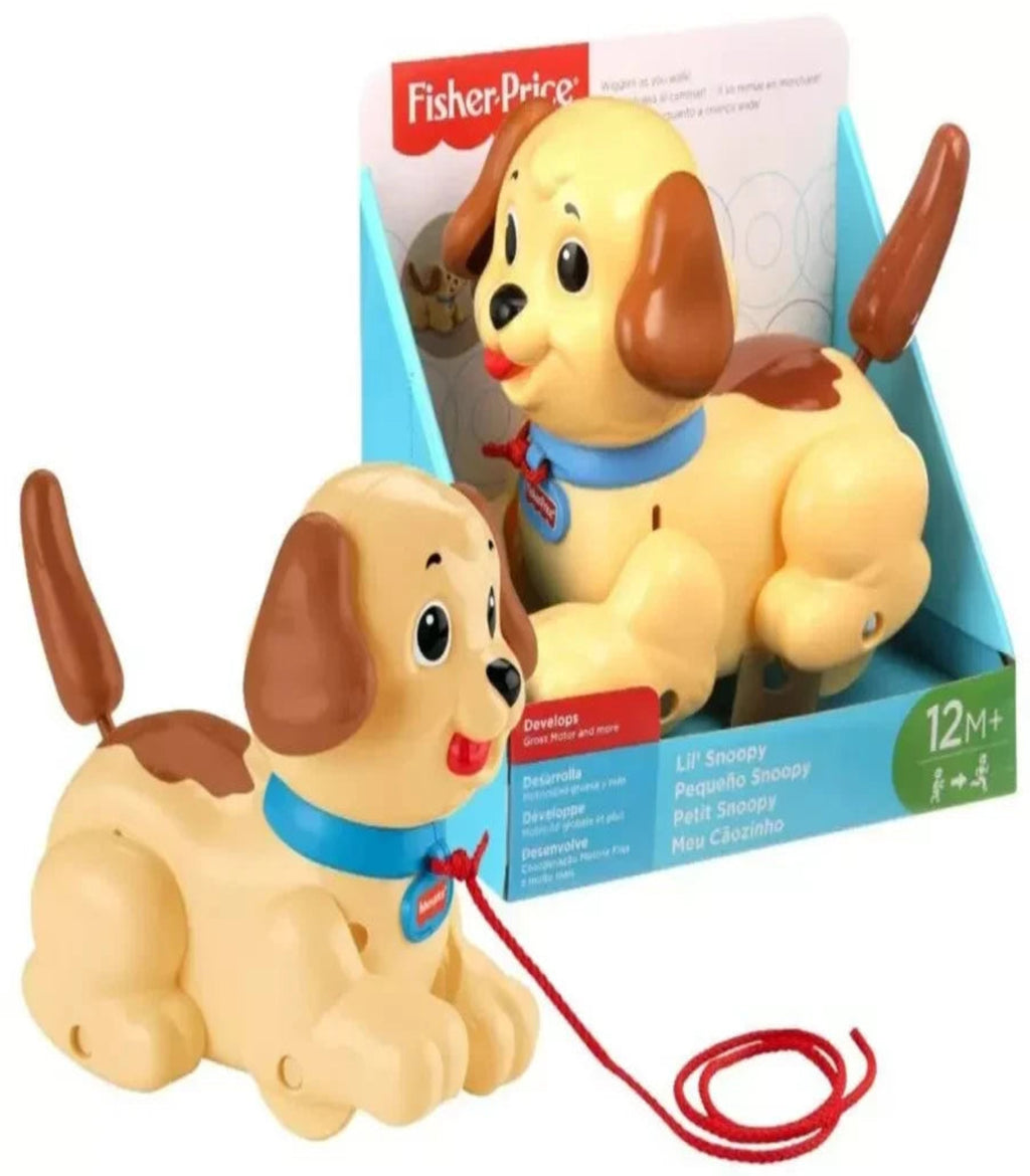 Fisher-Price toy dog with a leash in front of its packaging