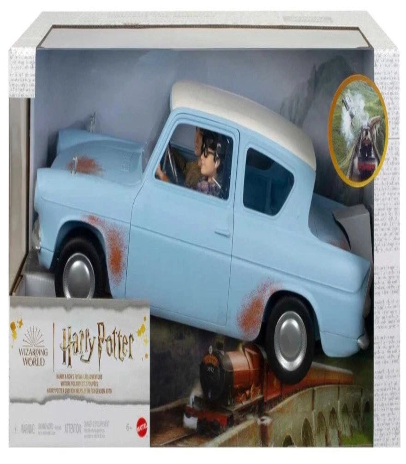 Toy model of a blue car with characters inside, displayed in packaging with 'Harry Potter' branding.