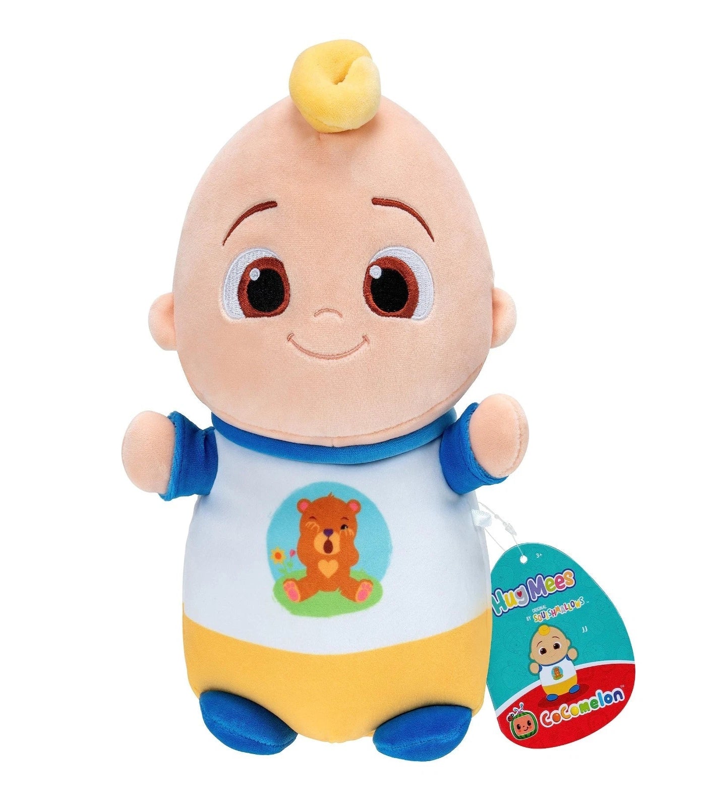 Toy baby figure with a yellow top, blue shirt, and white bib featuring a bear design, on a white background.