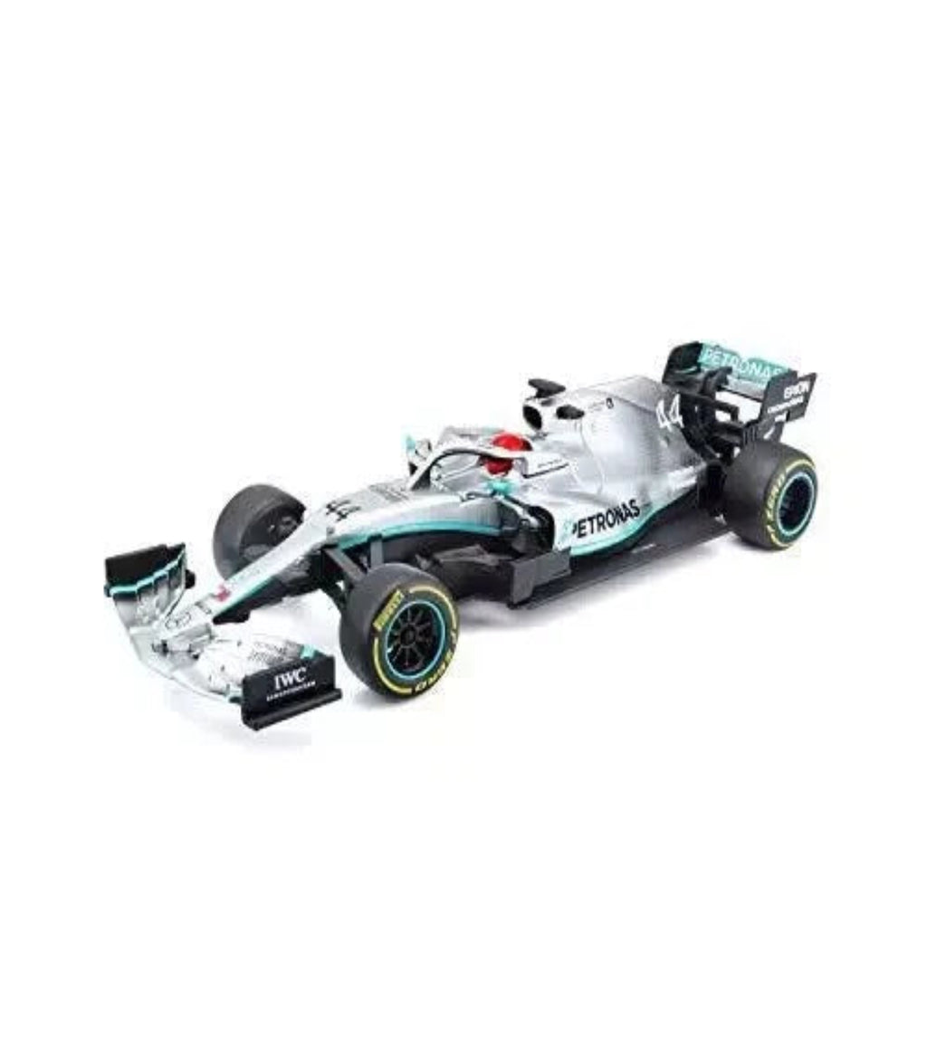 Model of a Formula 1 car with visible branding on a white background