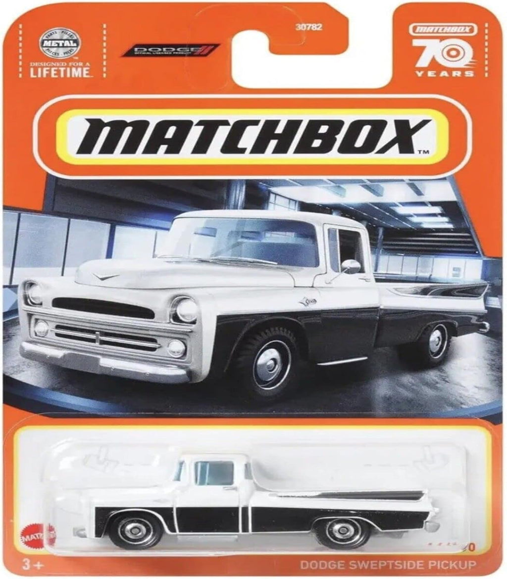 Matchbox Dodge Sweptside Pickup toy car in packaging with orange and white design.