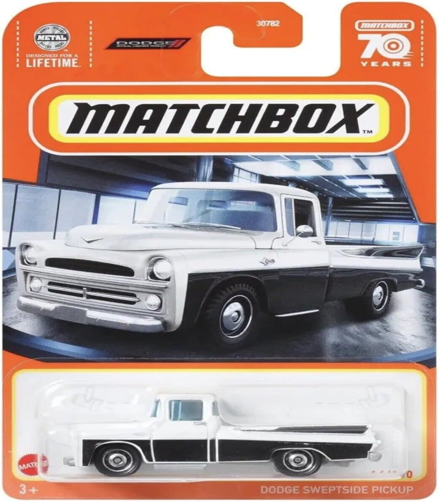 Matchbox Dodge Sweptside Pickup toy car in packaging with orange and white design.