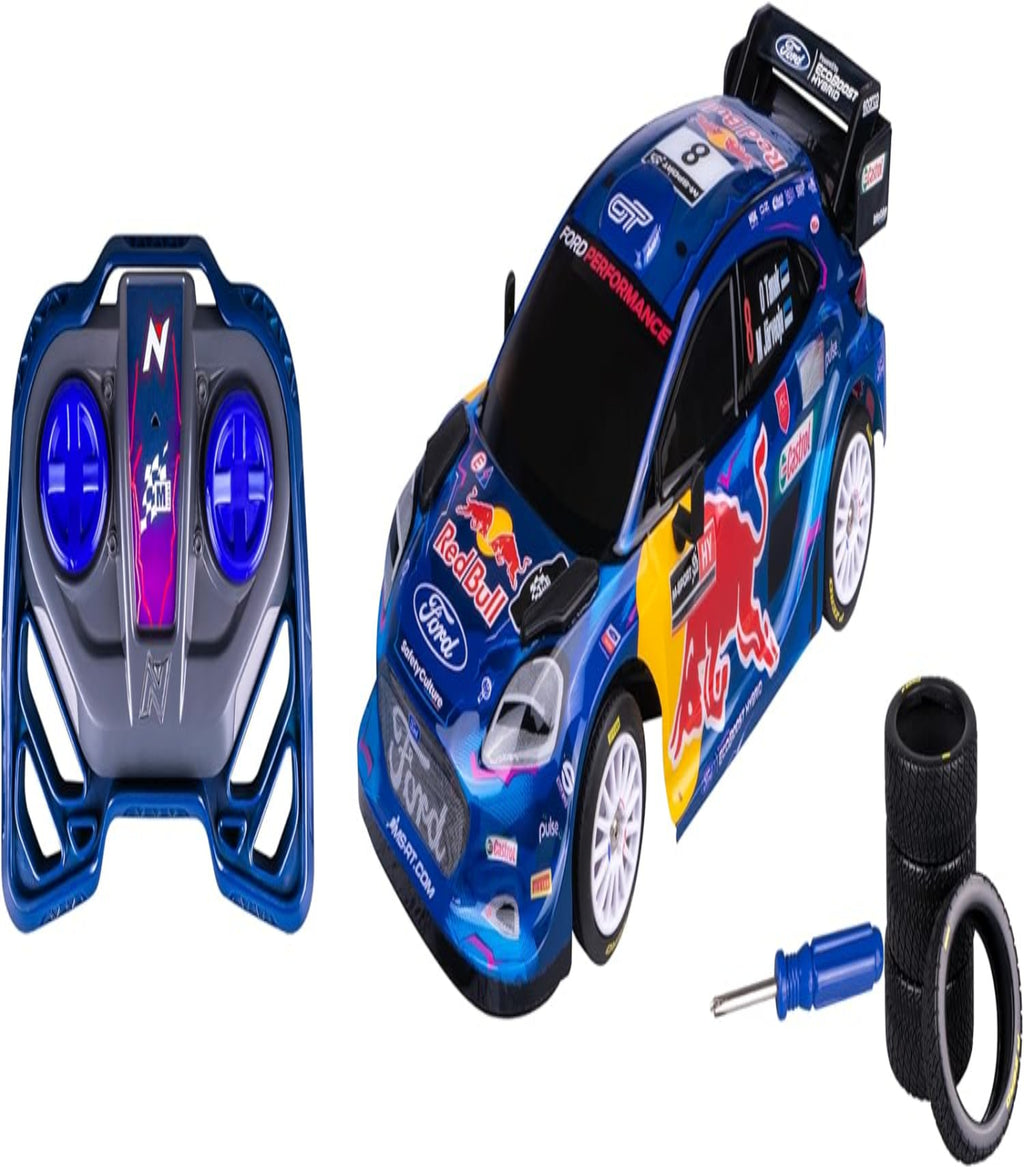 Remote control car with Red Bull branding and accessories on a white background