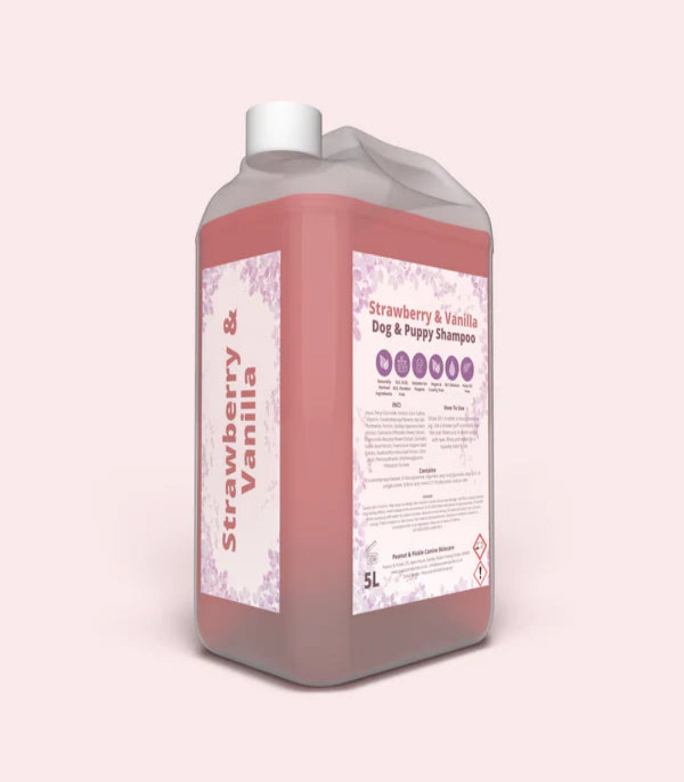Strawberry Vanilla dog and puppy shampoo bottle on a light pink background