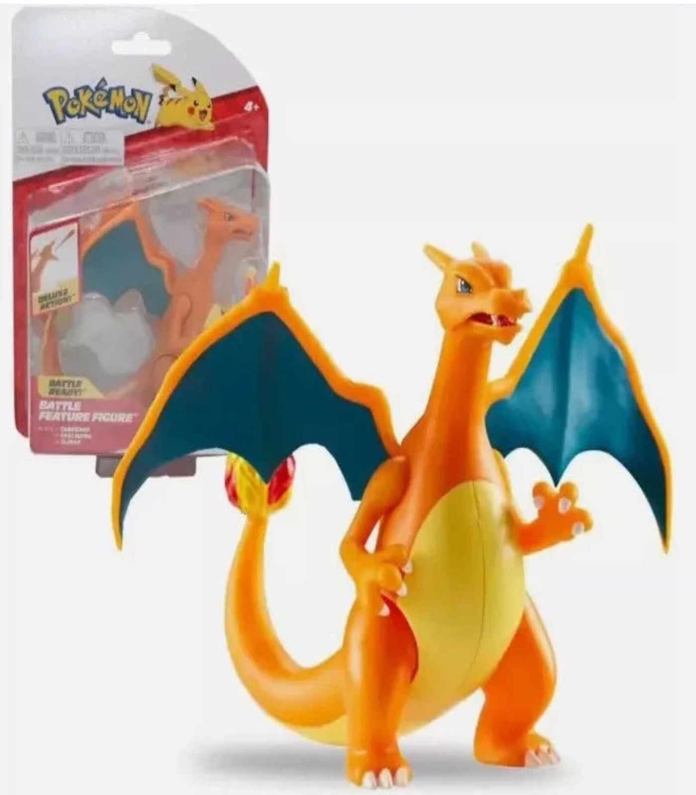 Pokémon Charizard action figure with packaging in the background