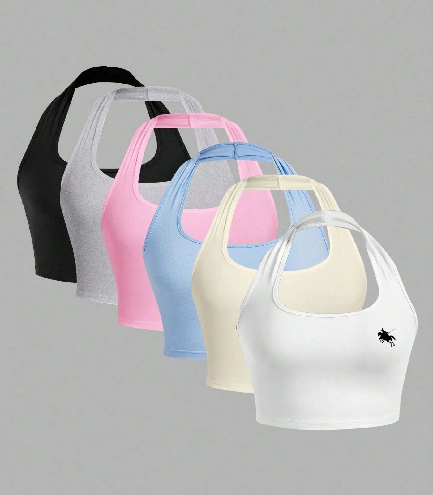 Set of six sports bras in various colors on a gray background