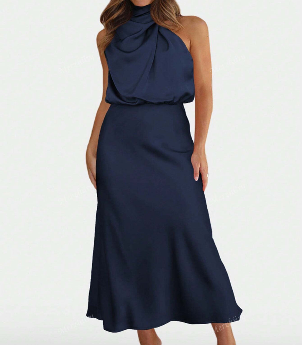 Navy blue halter neck dress on a white background