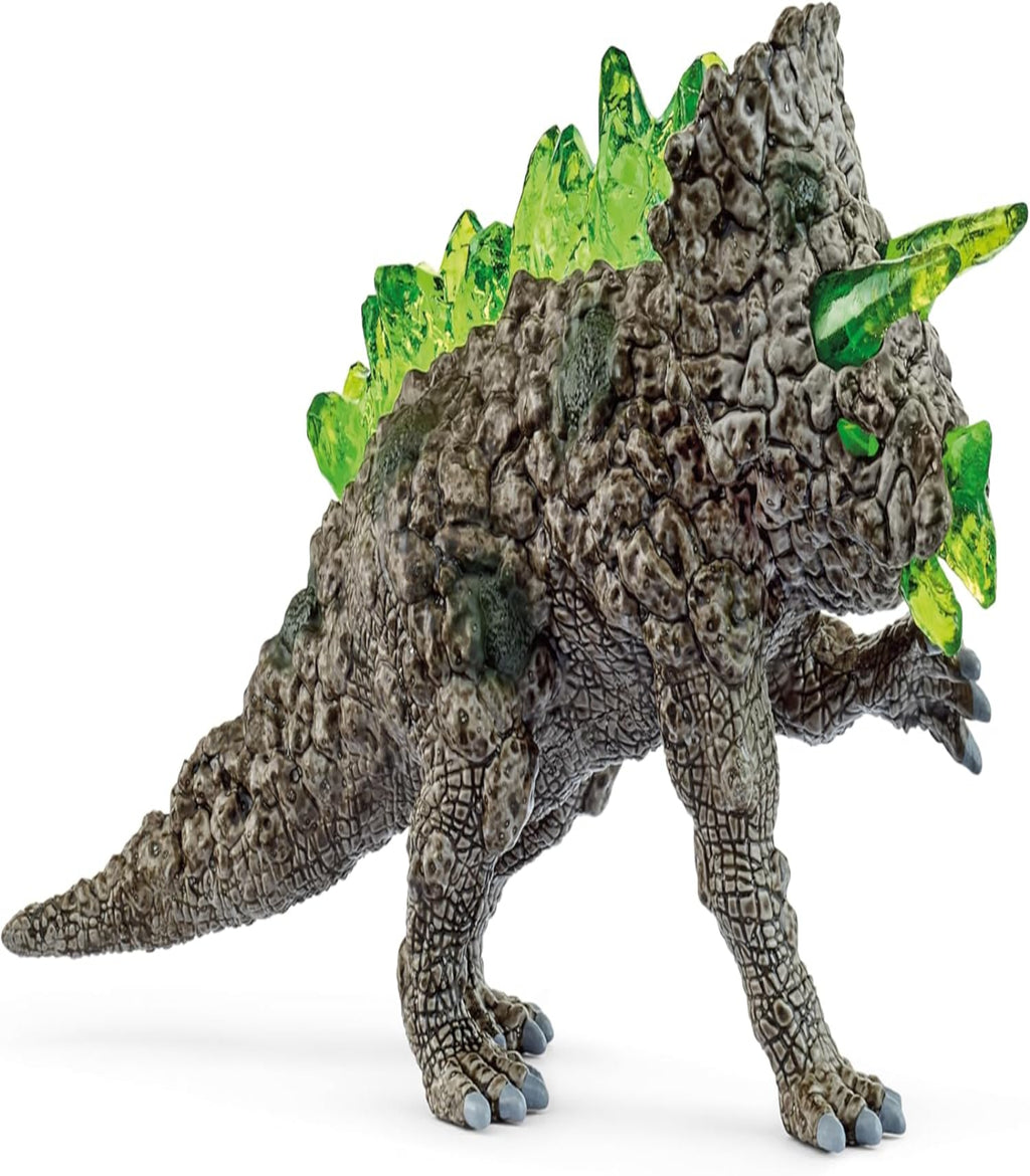 Toy dinosaur figure with a textured gray body and green spikes on a white background