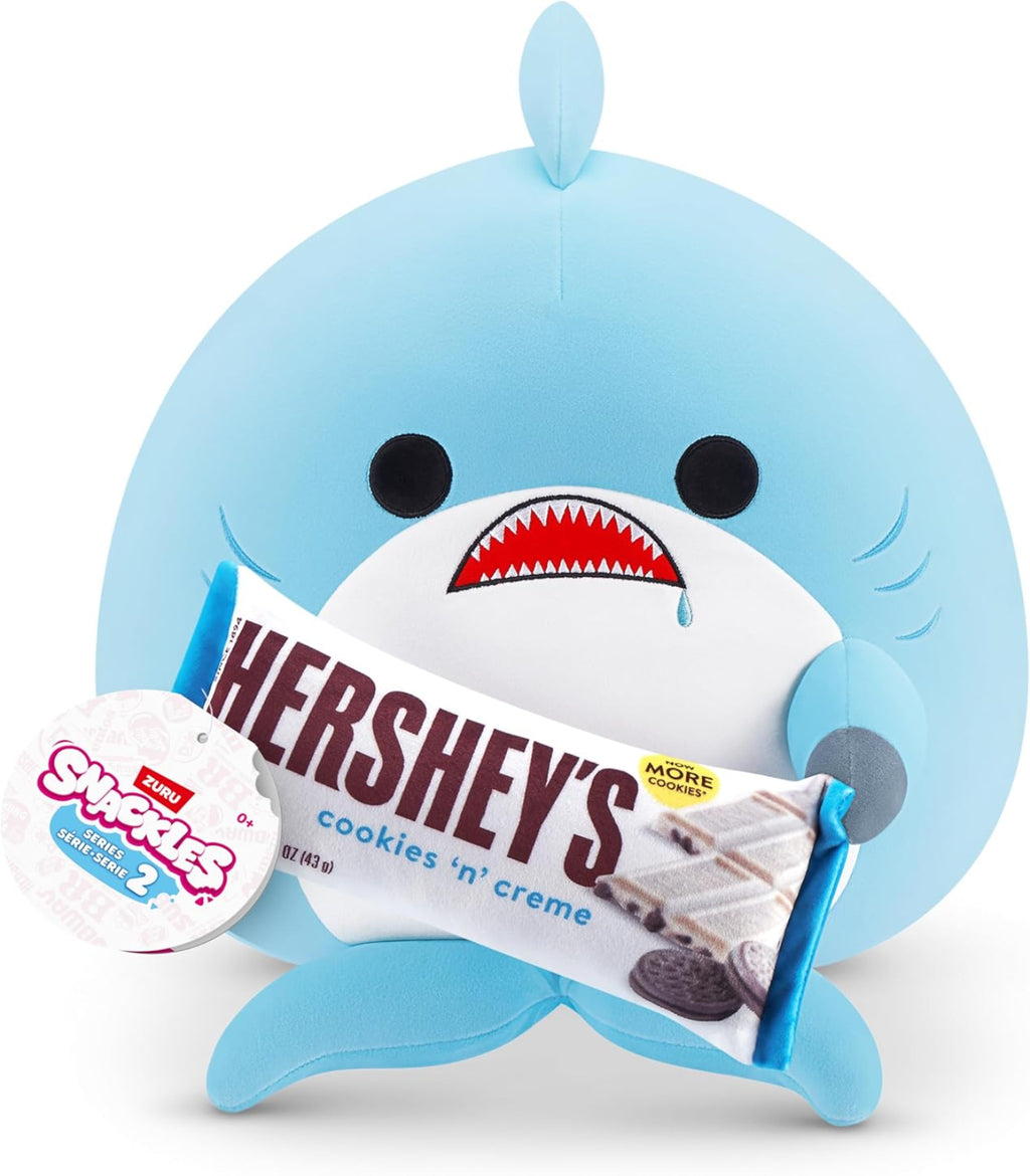 Blue shark-shaped holder with a Hershey's chocolate bar on a white background