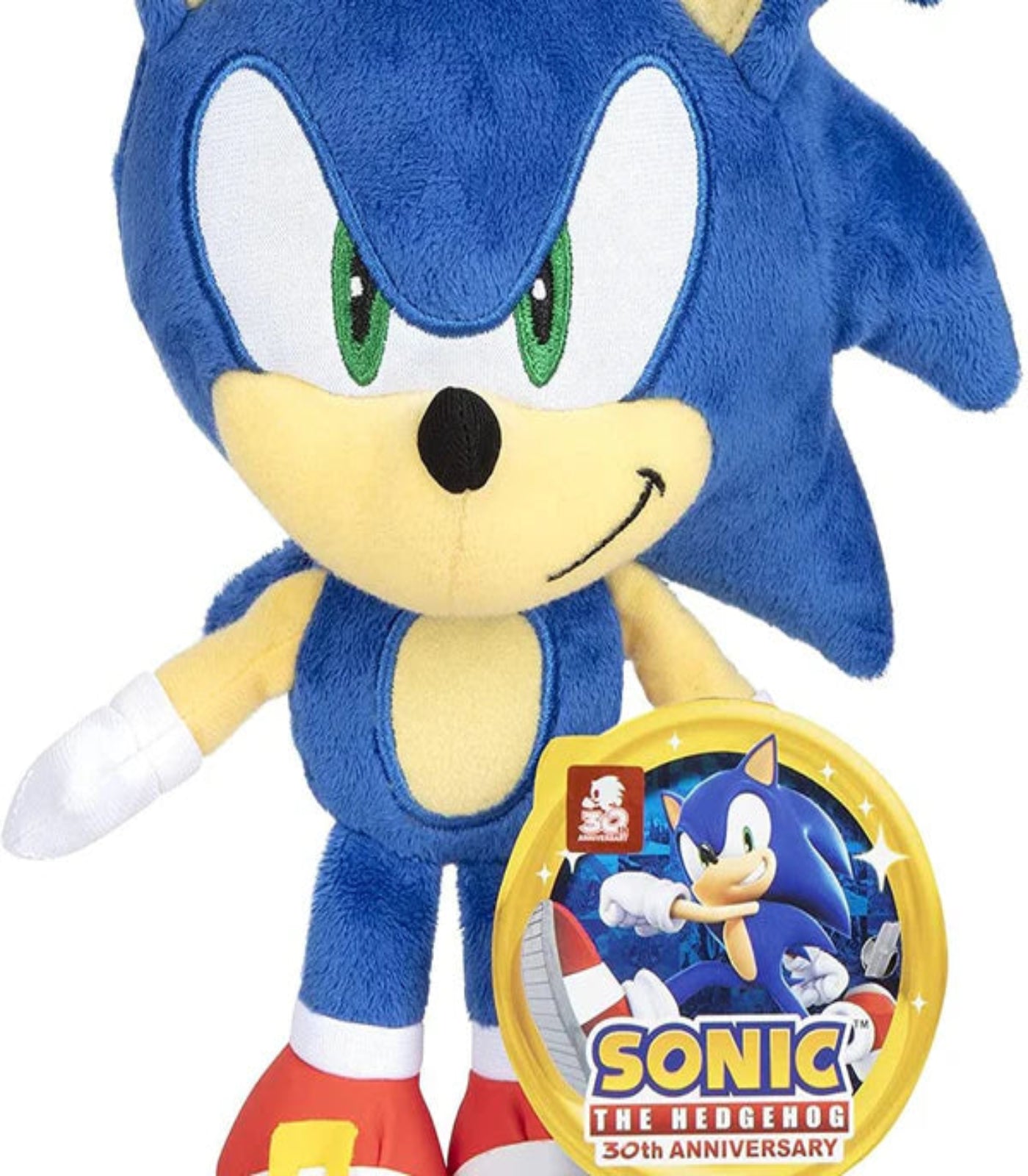 Plush toy of Sonic the Hedgehog with a badge celebrating his 30th anniversary.