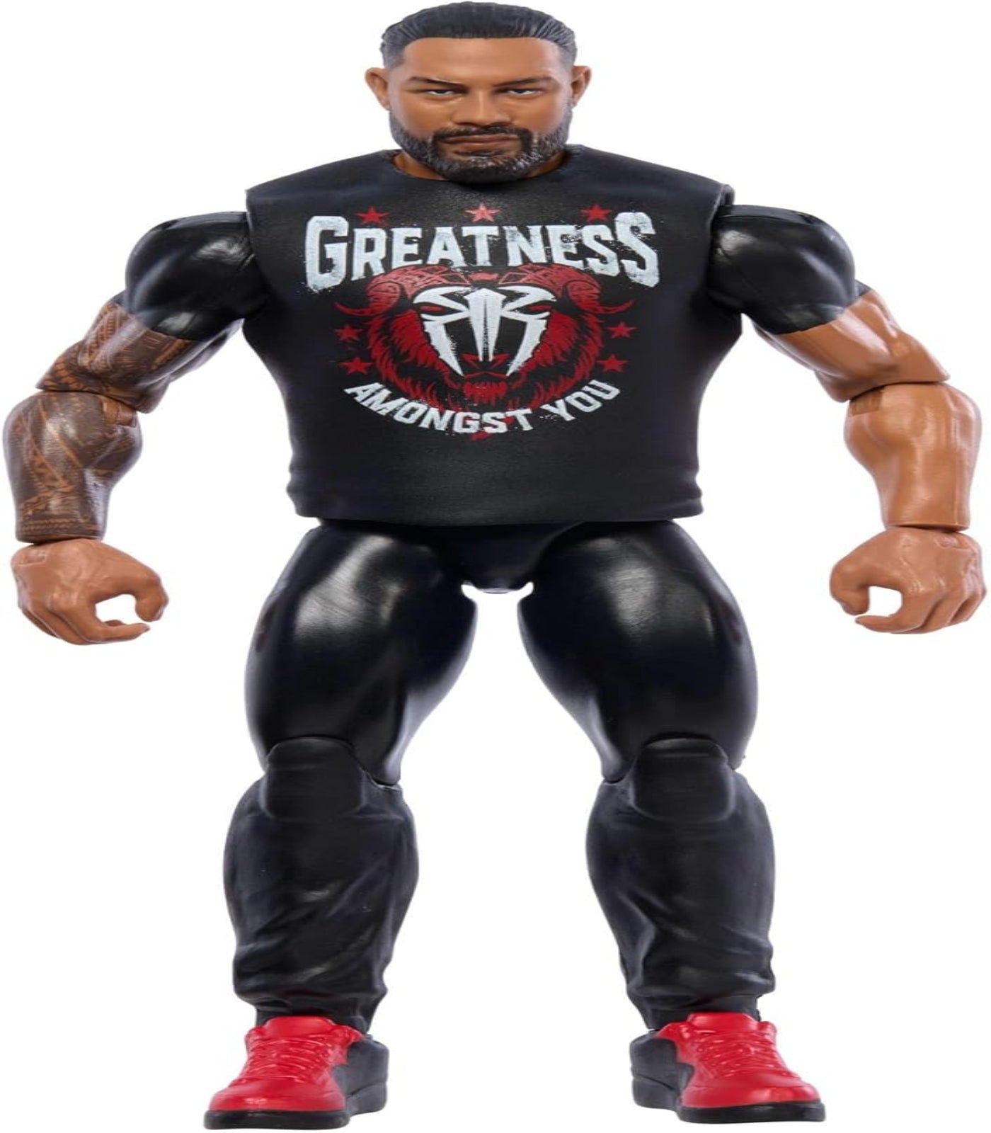 Wrestling figure wearing a black t-shirt with 'Greatness Amongst You' text and logo.