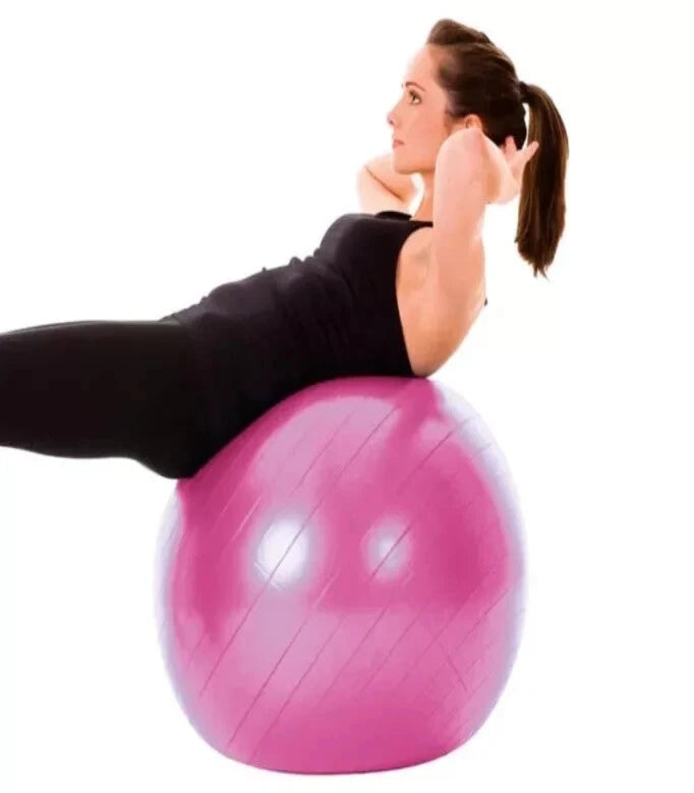 Woman exercising on a pink exercise ball against a white background